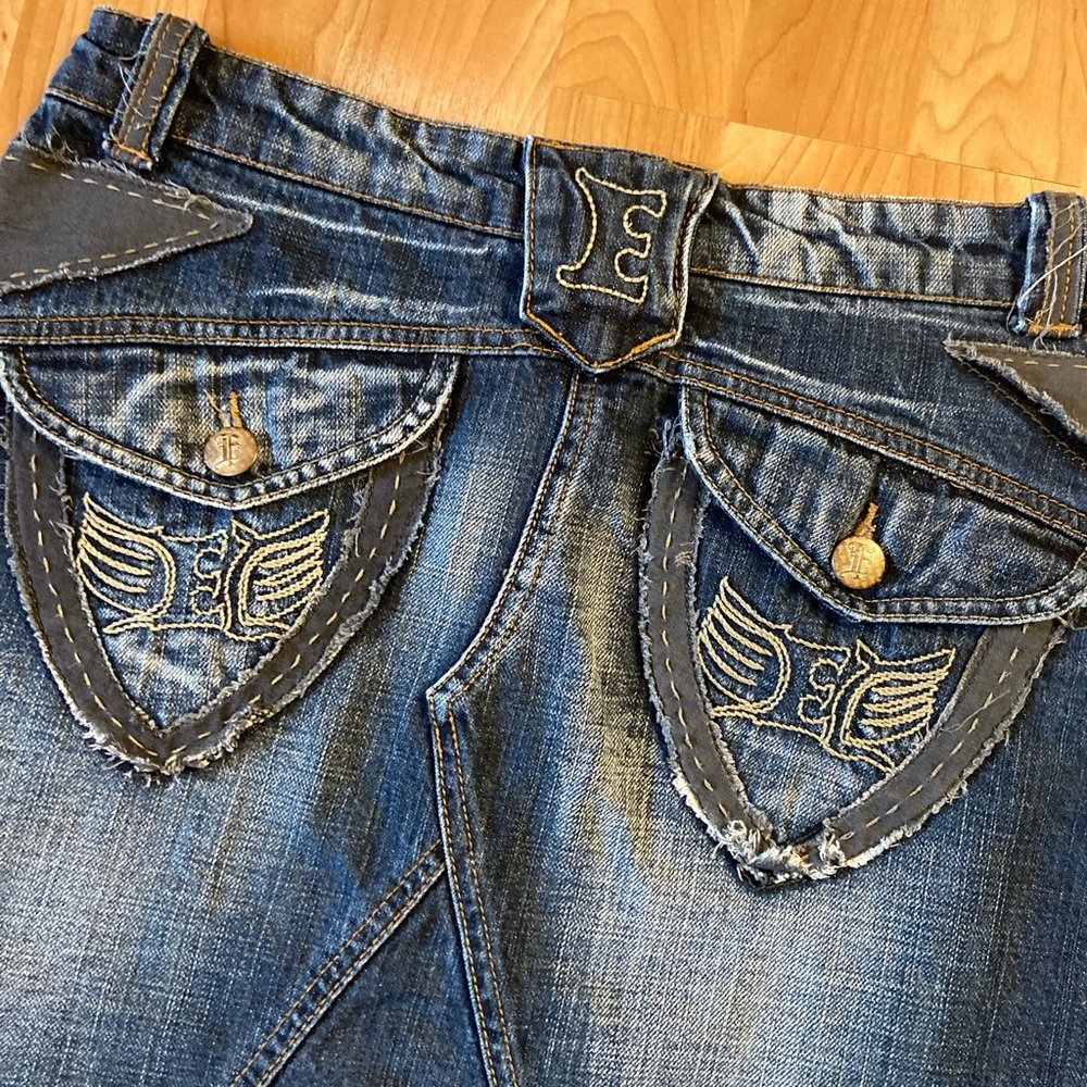 Embroidered Denim miniskirt with wing Design